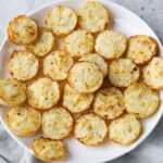 cheesy cauliflower bites on a plate
