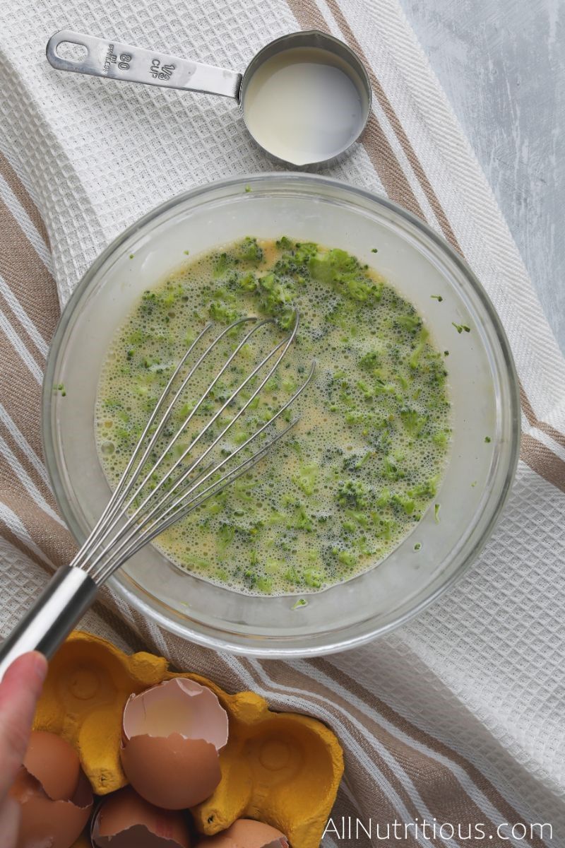 whisking broccoli into egg mixture