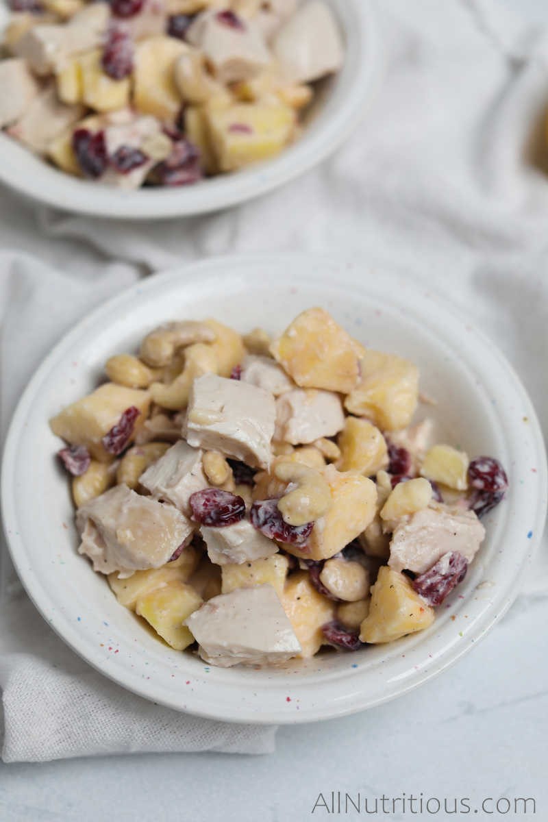 bowl of chicken salad with apples