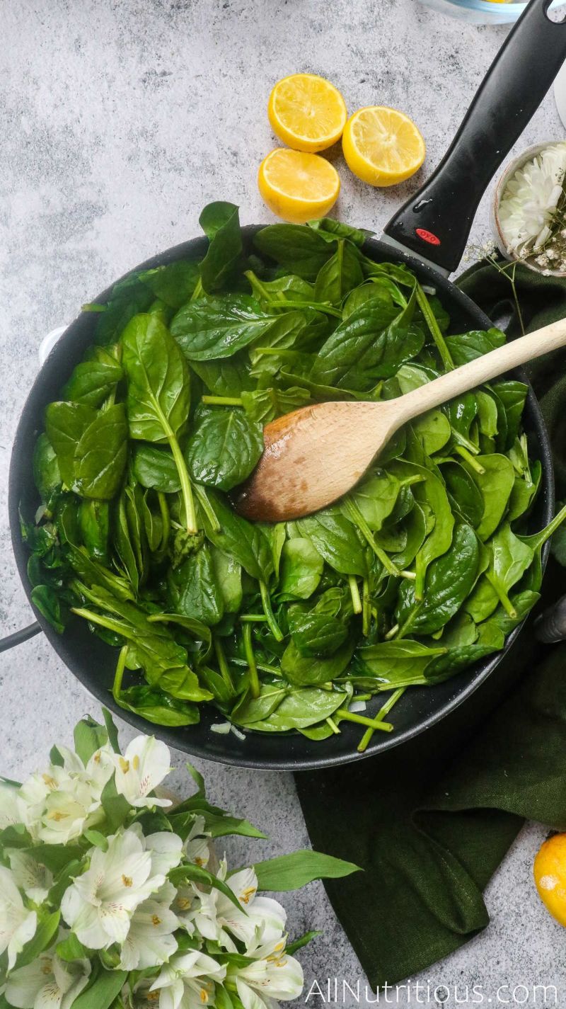 cooking spinach in pan