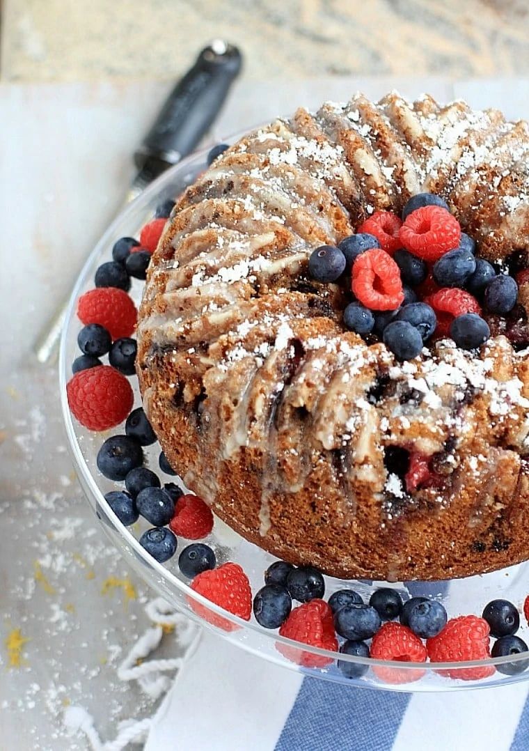 bundt cake with lemon glaze and fresh berries