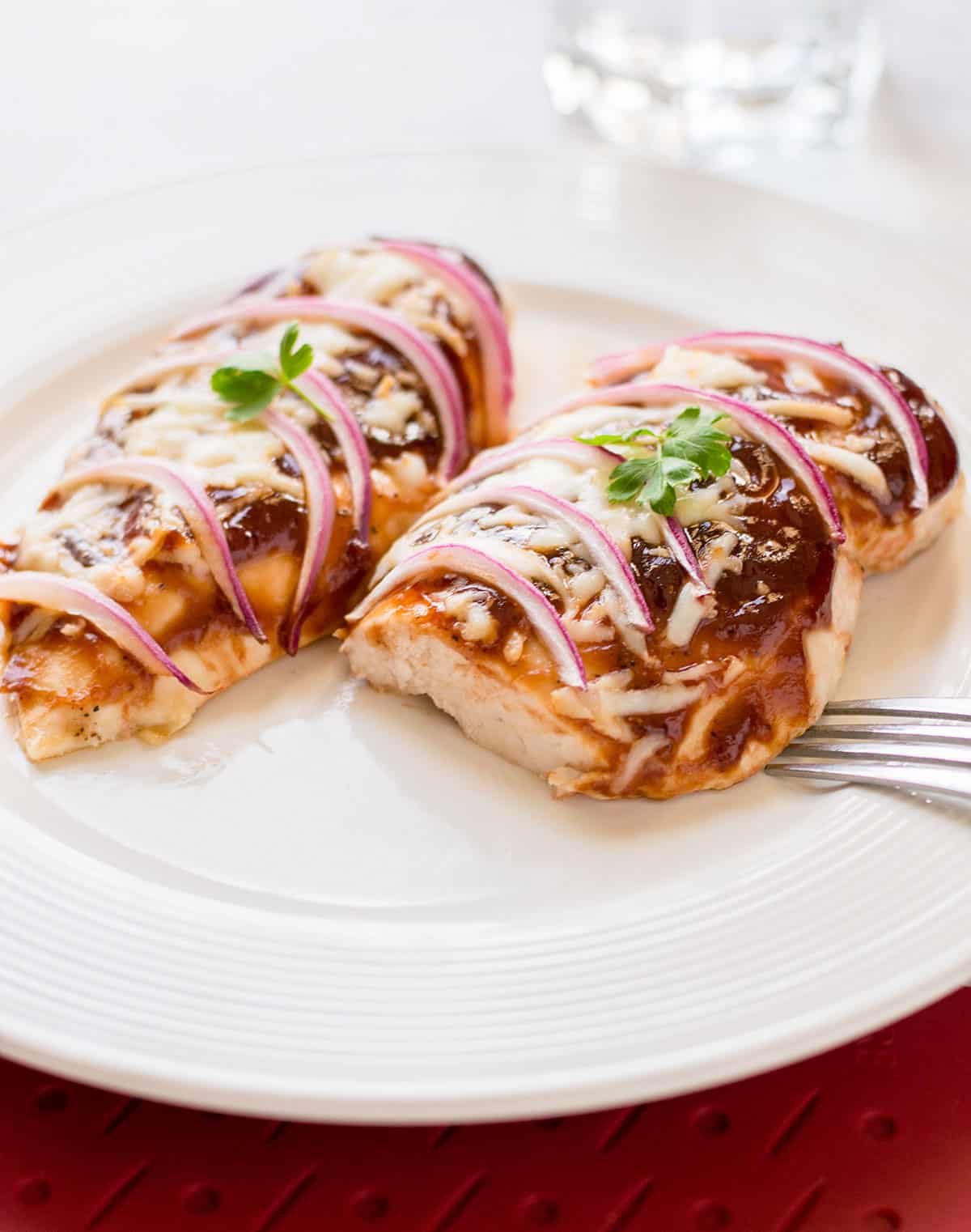 cheesy baked bbq chicken breast with onions