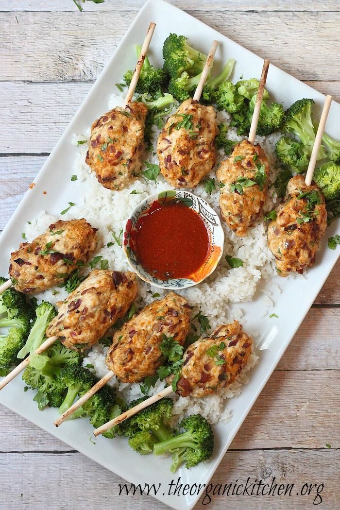 bacon sirarcha chicken skewers and coconut rice